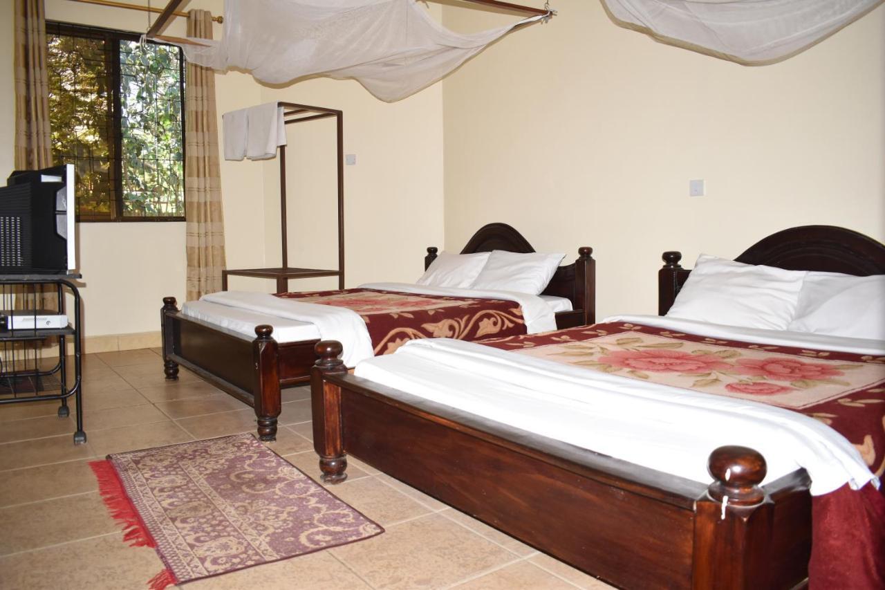 Rainbow Executive Lodge Boma la Ngombe Экстерьер фото